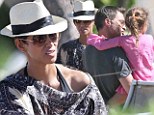 One happy trio! Halle Berry shows her affection on a Hawaiian vacation with fianc Olivier Martinez and her daughter Nahla