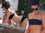 Meow! Kate Beckinsale shows off some cat-like Yoga poses as she shows off her slim body in a black bikini on Mexican holiday