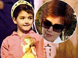 Just like mommy! Suri Cruise experiments with a new whispy mini bangs reminiscent of one of her mother's past hairstyles