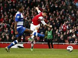 On target: Olivier Giroud helped Arsenal to a resounding victory over relegation-threatened Reading