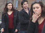 Feeling nervous? Nina Dobrev puffs on a cigarette before taking boyfriend Ian Somerhalder to her family home for Easter