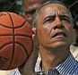 President Barack Obama plays basketball during the annual Easter Egg Roll on the White House tennis court April 1, 2013 in Washington, DC