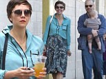 Almost a Marilyn moment! Laid back Maggie Gyllenhaal and husband Peter Sarsgaard enjoy a breezy afternoon with their family