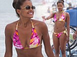 Making a splash: Claudia Jordan certainly proved more capable of winning approval on the beach in Miami on Saturday than when she was on Celebrity Apprentice 