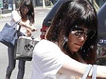 The secret to chic! Selma Blair seeks out some classic clothing on vintage shopping spree 