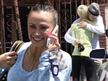 Getting close! Kellie Pickler and Derek Hough share a warm embrace as the cast of Dancing With The Stars leave grueling rehearsal