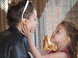 Nicole Richie's little look-alike Harlow tenderly stokes her cheek in touching moment on family outing