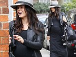 Effortlessly chic: Jenna Dewan-Tatum is one cool mother-to-be in a black maxi and leather jacket