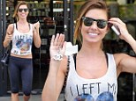 'I left my heart in Indio!': Audrina Patridge pines for Coachella as she displays her flat stomach in a midriff-baring top paired with skintight leggings 