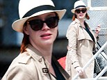 Staying undercover! Christina Hendricks goes incognito in trench coat, hat and sunglasses in a break from filming Ryan Gosling movie 