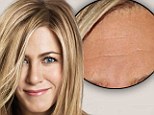 Now you see them, now you don't! Jennifer Aniston's forehead lines magically disappear with the aid of the airbrush in new haircare campaign 