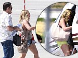 Ready to get away! Hilary Duff put her legs on display in short shorts as she and her family boarded a private jet at the Van Nuys Airport in Los Angeles, California on Friday