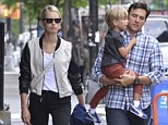 Family time as model Karolina Kurkova enjoys an afternoon stroll in New York with her husband Archie Drury and infant son Tobin.