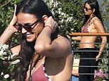 Yogi bare! Demi Moore, 50, looks tanned and happy as she shows off her youthful physique in bikini