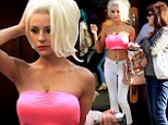 Am I missing something? Courtney Stodden omits outer garment and wears a gaudy pink tube-bra as she dines at a family-friendly restaurant