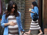Mother-to-be Jenna Dewan-Tatum shows off her bump to the maxi-mum in striped dress as she hails a cab