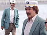 All aboard! Will Ferrell dons captain's hat to cruise in his painted trailer on the set of Anchorman: The Legend Continues