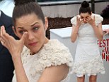 Tears of relief? Marion Cotillard sheds tears a photo call in Cannes... after her stalker is put on probation 