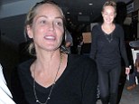 She doesn't need make-up! Sharon Stone is fresh-faced and radiant as she goes au natural for flight back from Cannes 
