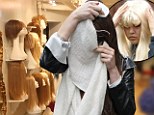 Shopping for a new look: Amanda Bynes wrapped her face in a scarf as she stepped into a few wig shops in New York City's West Village on Saturday