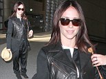 What was she thinking? Jennifer Love Hewitt drowns her curves in BIZARRE baggy trousers as she jets to Paris