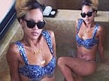 Sassy: 'Lil ol me in my big ol tub!!!' Rihanna posted to twitter on Saturday
