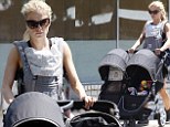 Supermom! Anna Paquin shows she can handle her own as she takes the twins out for a solo stroll in Ojai
