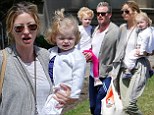 Just another casual Sunday! Eric Dane slouches around in sweatpants as he and wife Rebecca Gayheart carry their youngsters to a Beverly Hills birthday party