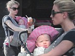 Down to a science! Anna Paquin takes her twin tots for a casual stroll around her Venice neighborhood without any help