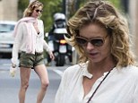 Eva Herzigova shows she's regained her slimline model figure just weeks after giving birth as she steps out in short shorts