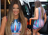 Khloe Kardashian vies for pregnant Kim's crown in the bootylicious stakes as she shows off her slimline figure in brights