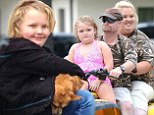 Tough times: Alana 'Honey Boo Boo' Thompson, mother 'Mama' June Shannon and father Mike 'Sugar Bear' Thompson, shown earlier this month, have been coping with sickness and the death of their family dog
