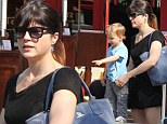 The fountain of youth! Selma Blair's boy Arthur is fascinated by water feature during outing in Los Angeles