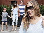 With her main men! Sarah Jessica Parker stops to enjoy some music with Matthew Broderick and son James Wilkie