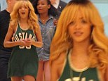 The original bad girl! Smiling Rihanna wears basketball vest in Barcelona as rapper Wale premieres their new track on the radio