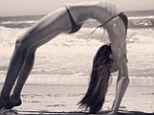 Flexible yoga fanatic Miranda Kerr flips over into a full back bend on the beach