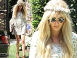 She is her father's daughter! Kimberly Stewart opts for a 1960's inspired flower-power frock as she attends Kim Kardashian's baby shower