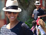 Good times: Halle Berry smiled on Monday as she picked up daughter Nahla from school after recently returning to Los Angeles after filming in Canada