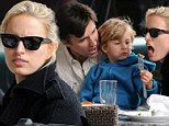 Are you going to eat that? Supermodel Karolina Kurkova steals a bite from son's burger during fun-filled family lunch