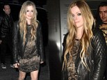 Snakeskin and leather! Avril Lavigne wears unique combo as she parties with male friends in London
