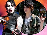 Outrage as Marilyn Manson simulates self harm onstage by holding knife to wrist after dedicating song to Paris Jackson following suicide bid
