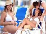 Lucky lady! Jamie-Lynn Sigler received a romantic massage from her fiance Cutter Dykstra as she bared her baby bump in a bikini at Myrtle Beach in South Carolina