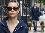 Mother-in-the-making: Jessica Biel showed her maternal side as she took her pups for a rainy day stroll in NYC on Friday