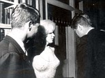 'Passed around': President John F Kennedy and his brother Bobby (left) with Marilyn Monroe