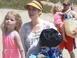 We need a beach day! Amy Adams plays in the sand with daughter Aviana and fianc Darren Le Gallo