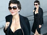 That's not like you! Maggie Gyllenhaal shows her sexy side in low-cut and split black dress to promote White House Down