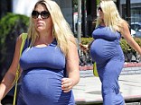 Almost time! Busy Philipps showed her huge baby bump as she strolled around West Hollywood, California on Tuesday