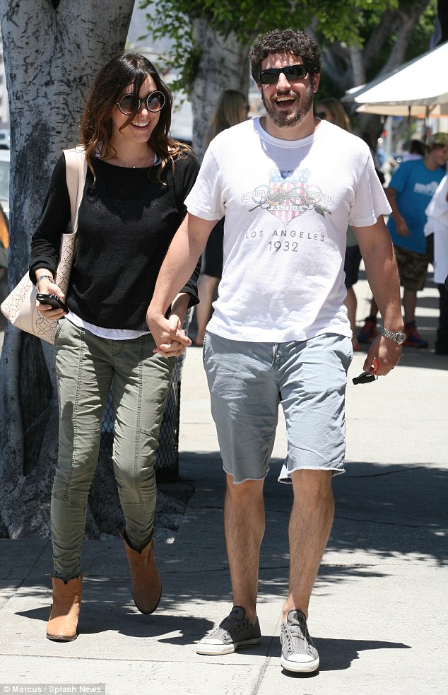 Happy together: Jason and Jenny were all smiles as they took an afternoon stroll following their lunch