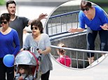 Make-up free Tiffani Thiessen and her daughter Harper splash around New York's Central Park during family outing
