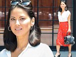 Lady in red! Olivia Munn makes over her 'hot' girl image and is prim and proper in a conservative blouse and long skirt